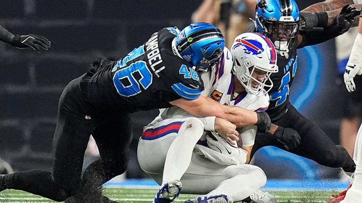 Detroit Lions linebacker Jack Campbell (46) tackles Buffalo Bills quarterback Josh Allen (17) during the first half at Ford Field in Detroit.