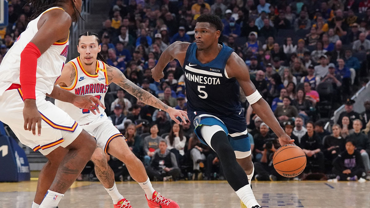 Minnesota Timberwolves guard Anthony Edwards (5) drives to the basket against Golden State Warriors forward Lindy Waters III (43) in the second period at Chase Center. 