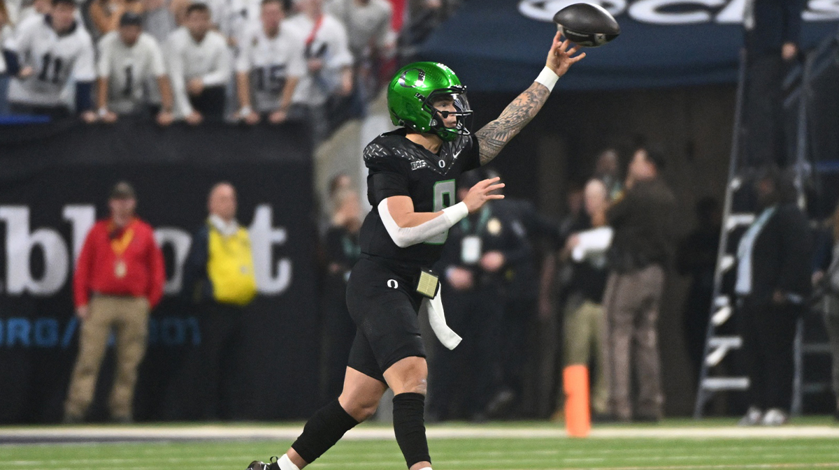 Oregon Ducks quarterback Dillon Gabriel (8) throws during the first quarter against the Penn State Nittany Lions in the 2024 Big Ten Championship game at Lucas Oil Stadium.