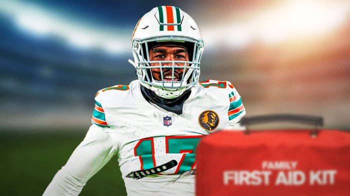 Dolphins' Jaylen Waddle with medical Red Cross symbol