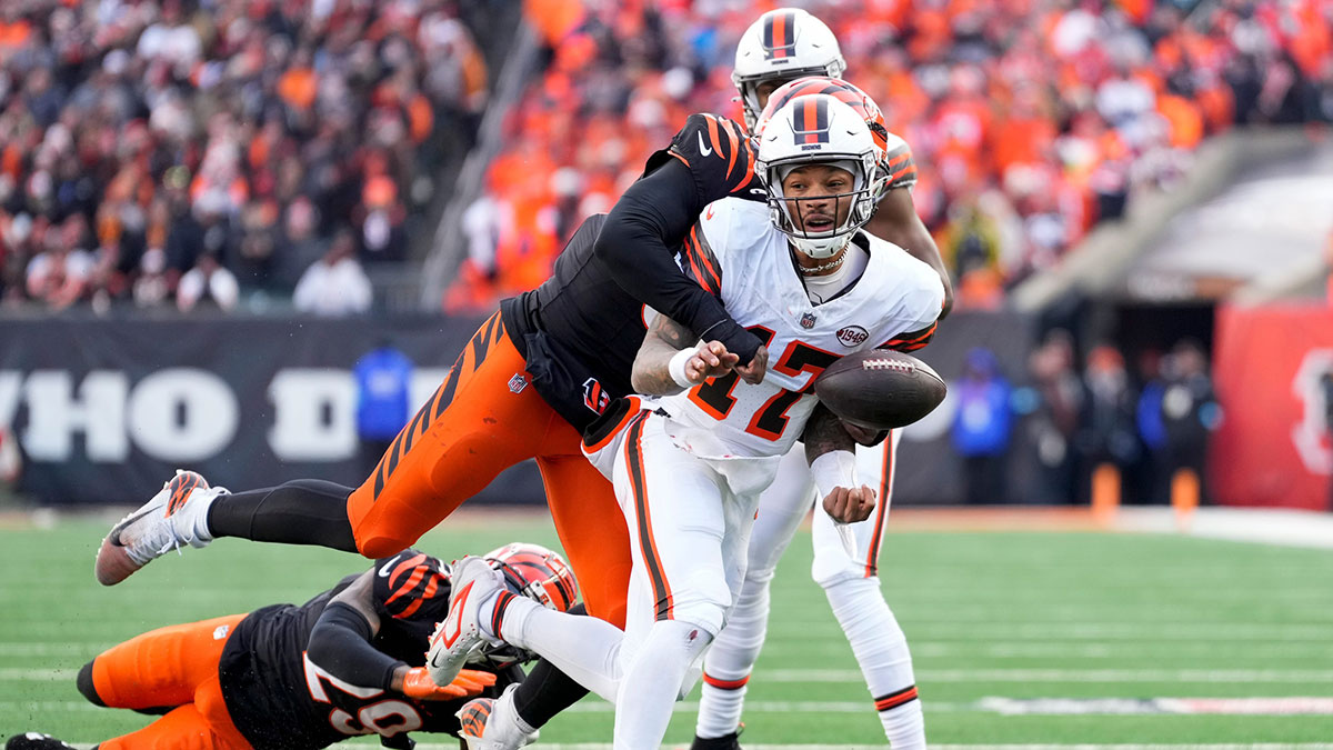 Cleveland Browns quarterback Dorian Thompson-Robinson (17) fumbles the ball as he is wrapped up by Cincinnati Bengals defensive end Joseph Ossai (58) in the fourth quarter of the NFL Week 16 game between the Cincinnati Bengals and the Cleveland Browns at Paycor Stadium in downtown Cincinnati on Sunday, Dec. 22, 2024. The Bengals won 24-16.