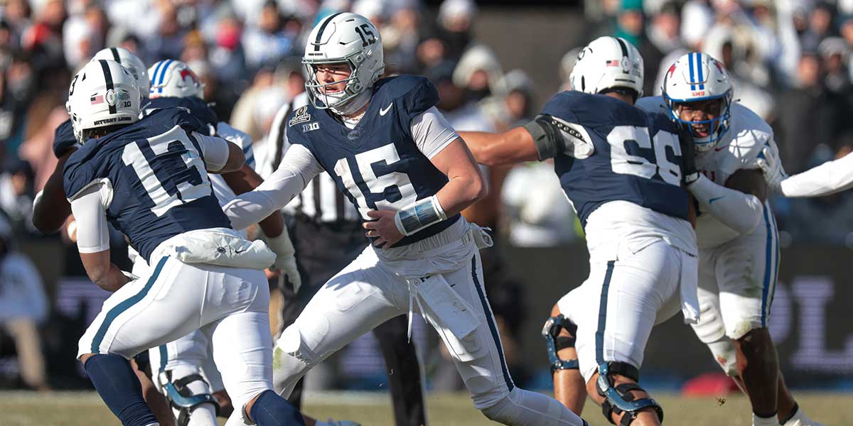 Penn State Nittany Lions quarterback Drew Allar (15) hands off to running back Kaytron Allen (13) during the first half against the Southern Methodist Mustangs at Beaver Stadium.