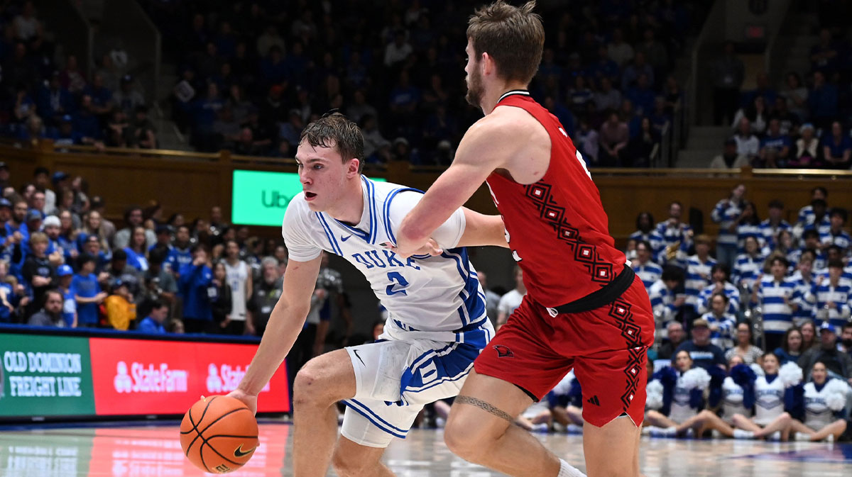 Duke Blue Devils forward Cooper Flagg (2) drives to the basket as Incarnate Word Cardinals forward Dylan Hayman (2) defends during the second half at Cameron Indoor Stadium.