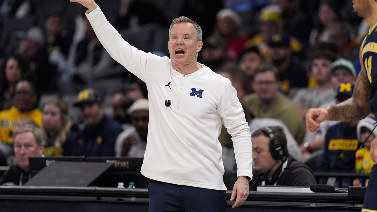 Michigan Wolverines head coach Dusty May yells to his team during the first half against the Oklahoma Sooners at Spectrum Center.