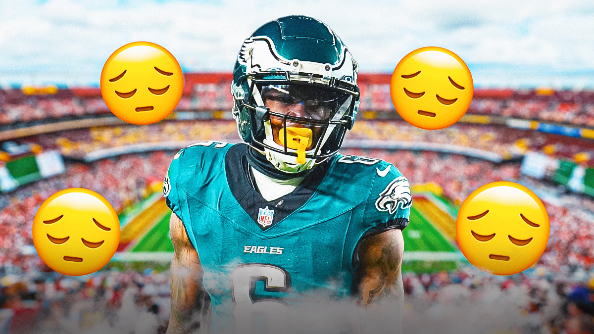 Eagles WR DeVonta Smith looking upset/sad with multiple 😔 emojis in background. Background is Northwest Stadium (Commanders stadium).