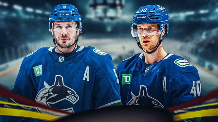 Canucks players Elias Pettersson and J.T. Miller