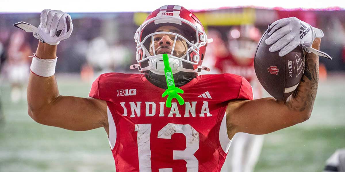 Indiana's Elijah Sarratt (13) celebrates a touchdown during the Indiana versus Purdue football game