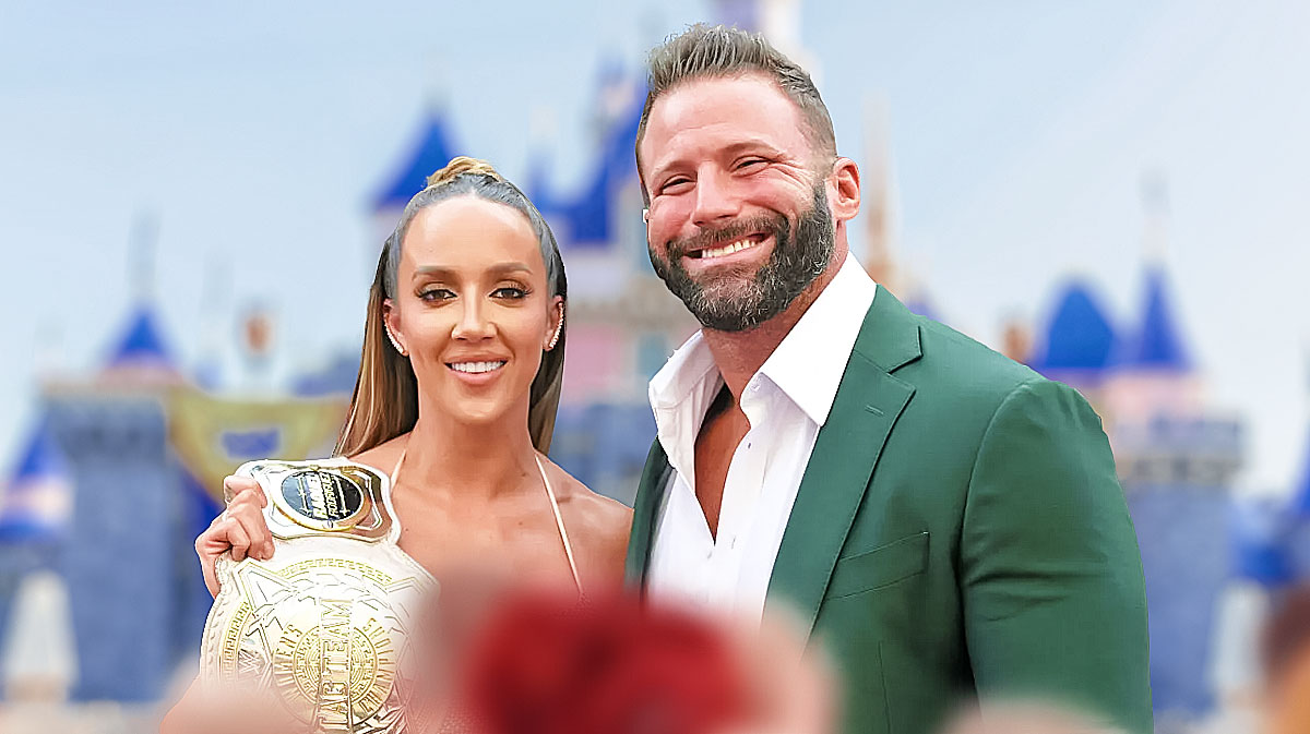 WWE Women's United States Champion Chelsea Green and Matt Cardona (formerly Zack Ryder) with Disneyland background.