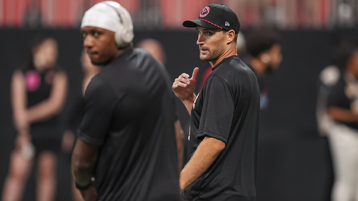 Atlanta Falcons quarterbacks Michael Penix Jr. (9) and Kirk Cousins (18) on the field prior to the game against the Pittsburgh Steelers at Mercedes-Benz Stadium.