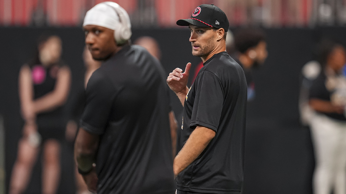 Atlanta Falcons quarterbacks Michael Penix Jr. (9) and Kirk Cousins (18) on the field prior to the game against the Pittsburgh Steelers at Mercedes-Benz Stadium