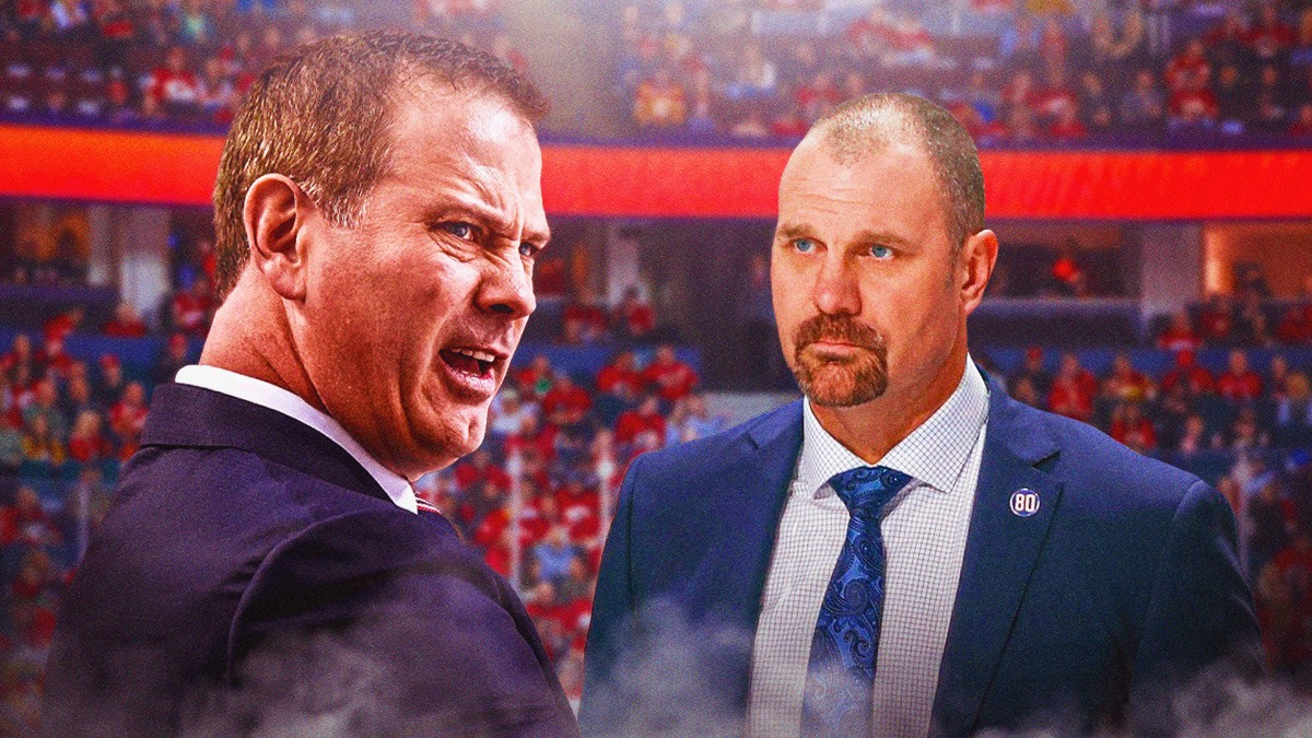 Flames assistant coach Brad Larsen and GM Craig Conroy inside the Saddledome