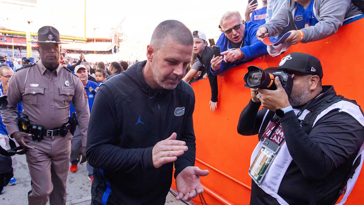 Florida Gators head coach Billy Napier claps his hands at Ben Hill Griffin Stadium in Gainesville, FL on Saturday, November 23, 2024 after the Gators defeated the Rebels 24-17.