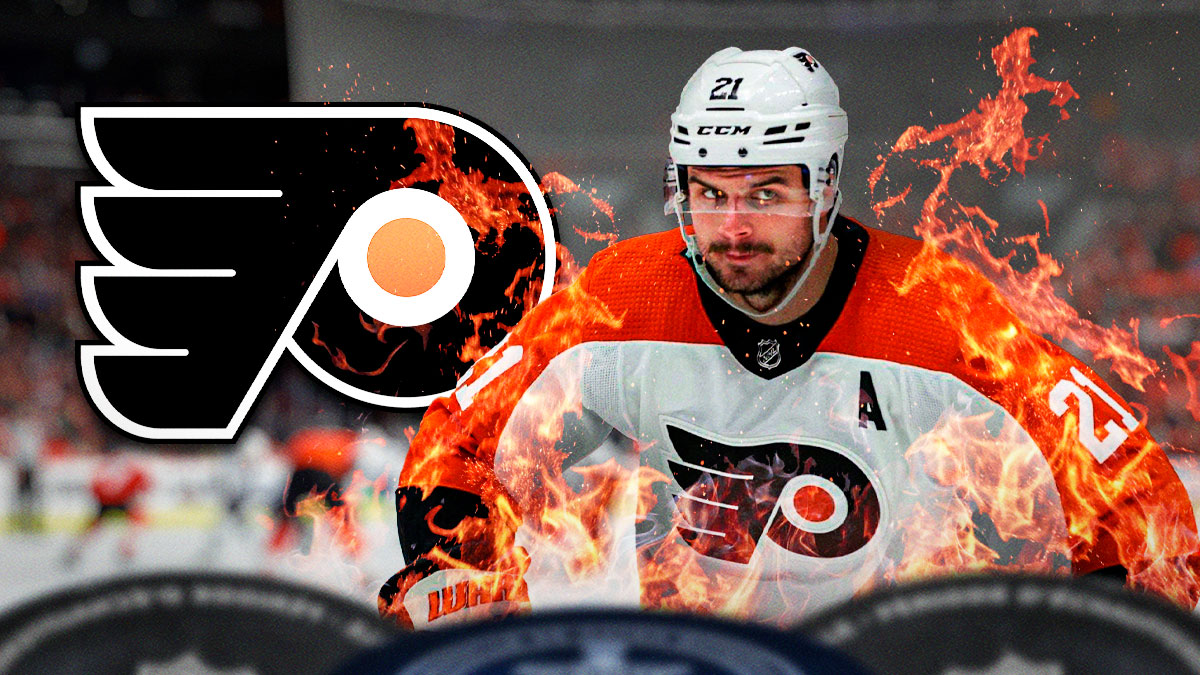 Scott Laughton in action looking happy with fire around him, Philadelphia Flyers logo, hockey rink in background