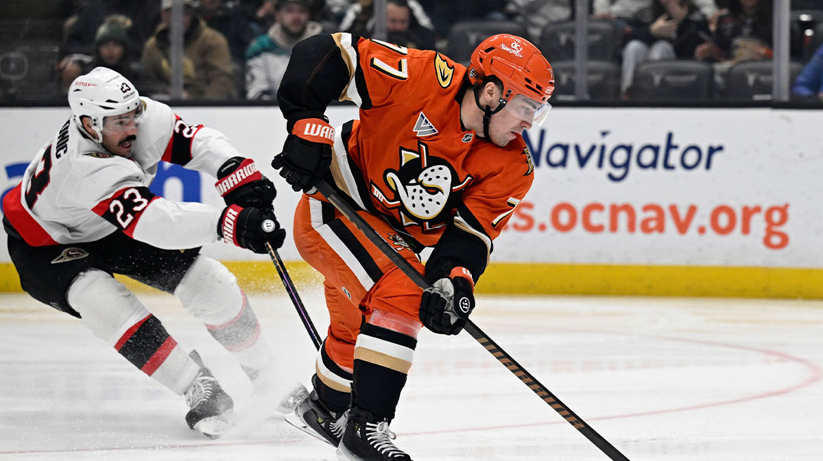 Anaheim Ducks right wing Frank Vatrano (77) controls the puck with pressure from Ottawa Senators defenseman Travis Hamonic (23) during the second period at Honda Center.