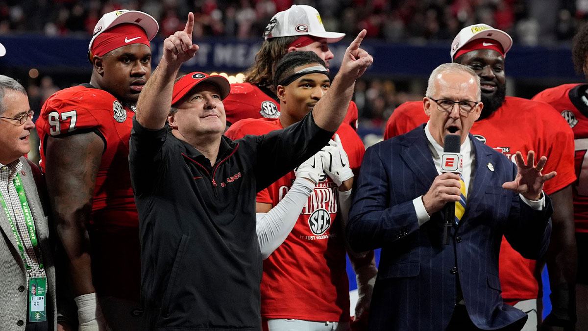 Georgia coach Kirby Smart celebrates with his team after the winning the SEC championship game against Texas in Atlanta, on Saturday, Dec. 7, 2024. Georgia won 22-19.