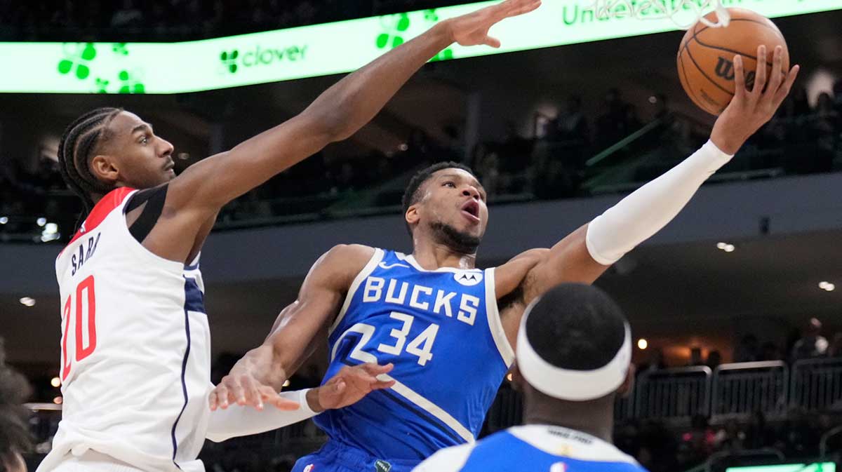 Milwaukee Bucks forward Giannis Antetokounmpo (34) drives to the basket against Washington Wizards forward Alexandre Sarr (20) in the first half at Fiserv Forum.
