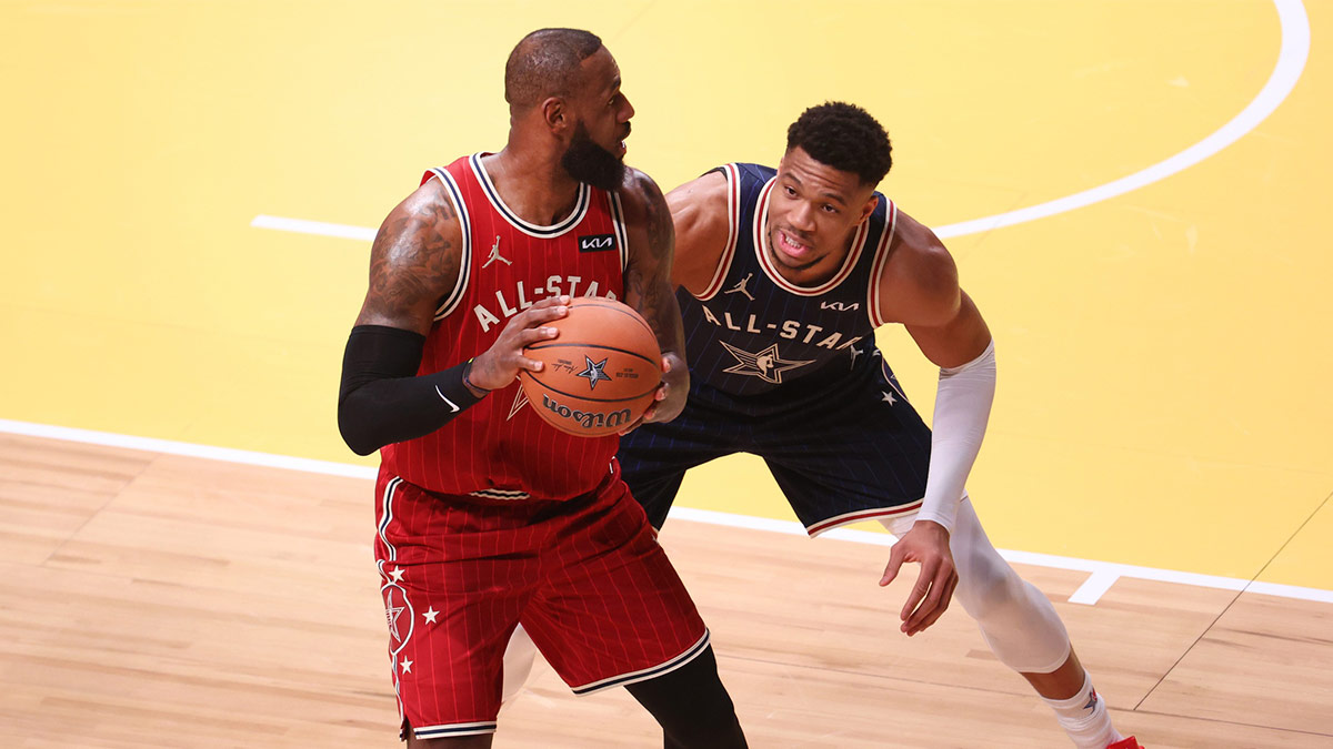 Eastern Conference forward Giannis Antetokounmpo (34) of the Milwaukee Bucks defends Western Conference forward LeBron James (23) of the Los Angeles Lakers during the first quarter in the 73rd NBA All Star game at Gainbridge Fieldhouse. 
