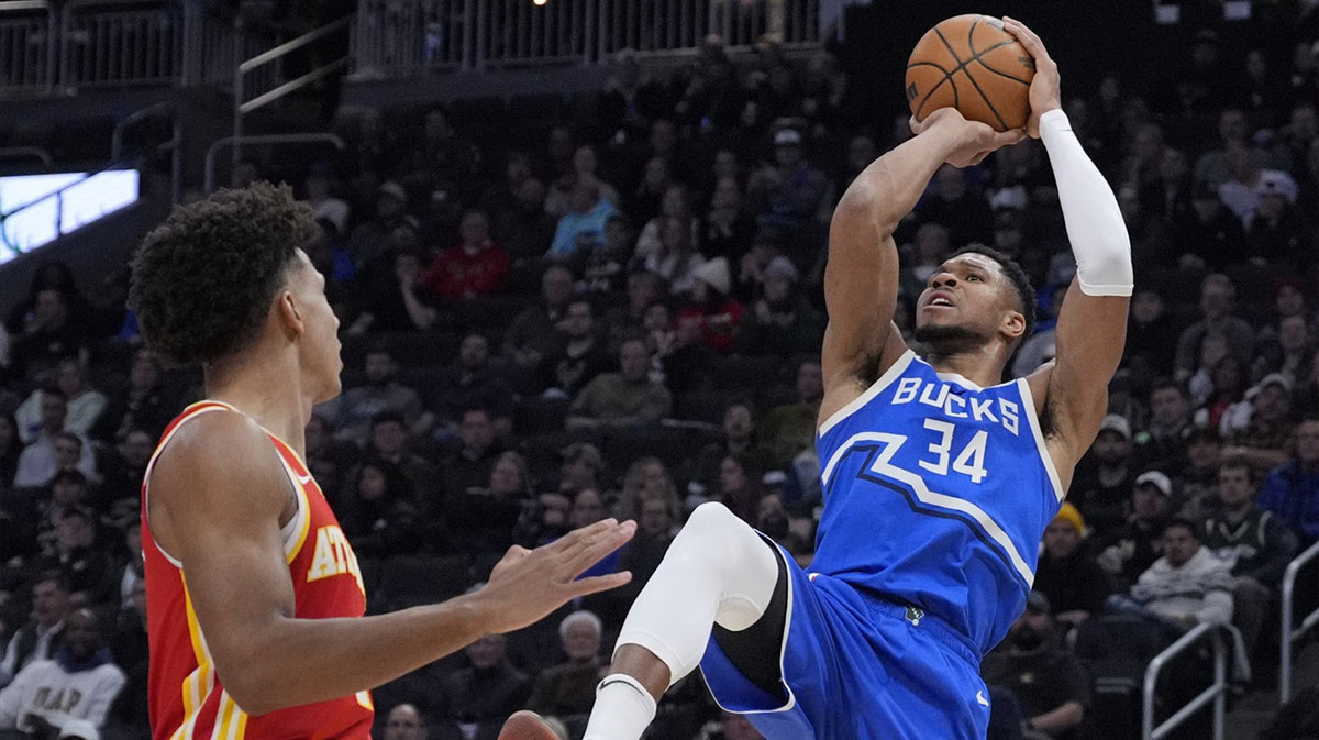 Milwaukee Bucks forward Giannis Antetokounmpo (34) puts up a shot against Atlanta Hawks forward Zaccharie Risacher (10) in the first half at Fiserv Forum.