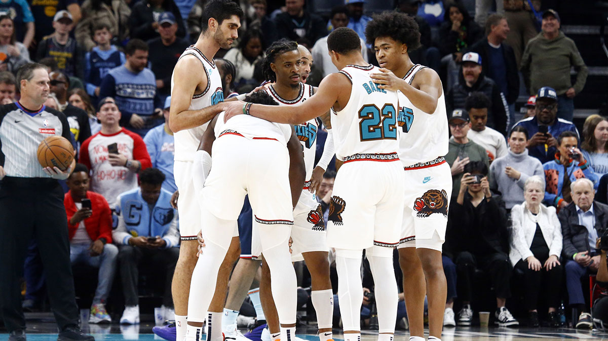 Grizzlies forward Santi Aldama (7), forward Jaren Jackson Jr. (13), guard Ja Morant (12), guard Desmond Bane (22) and forward Jaylen Wells (0) huddle during the fourth quarter against the Los Angeles Clippers at FedExForum