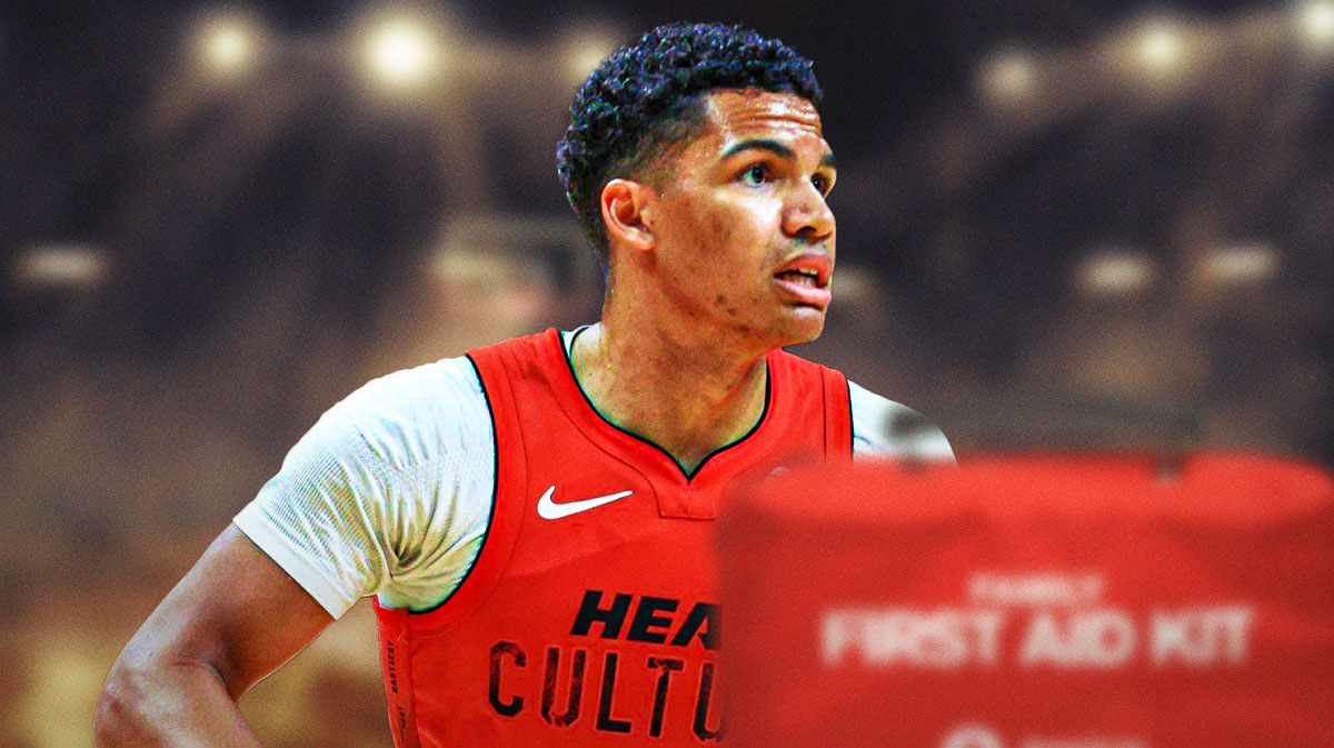 Heat Dru Smith with first aid kit