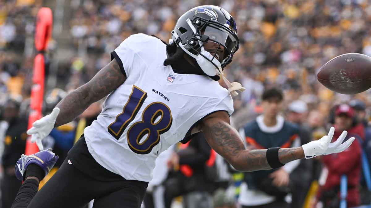 Baltimore Ravens wide receiver Diontae Johnson (18) reaches for an incomplete pass against the Pittsburgh Steelers during the first quarter at Acrisure Stadium.