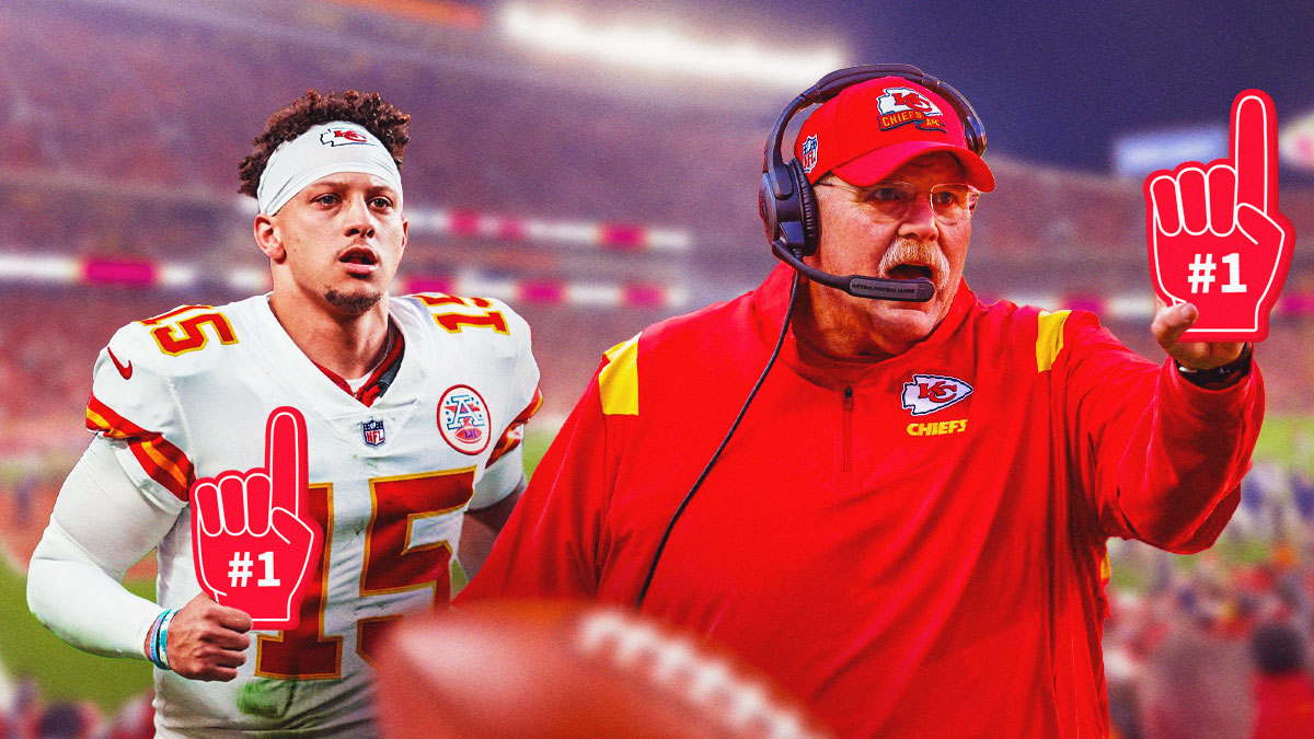 Patrick Mahomes and Andy Reid of the Chiefs both holding a red No. 1 foam finger.