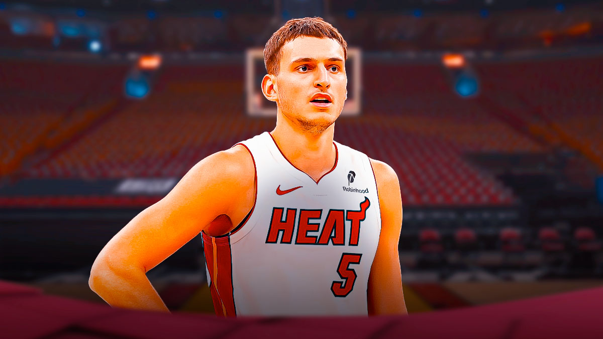 Miami Heat star Nikola Jovic in front of Kaseya Center.