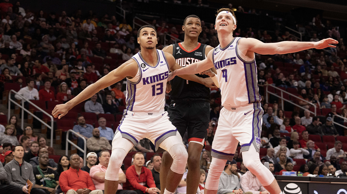 Sacramento Kings forward Keegan Murray (13) and Sacramento Kings guard Kevin Huerter (9) block out Houston Rockets forward Jabari Smith Jr. (1) in the second quarter at Toyota Center.