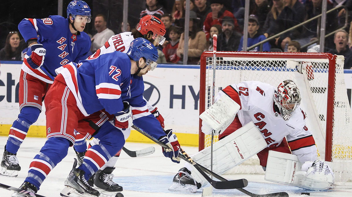 Carolina Hurricanes goaltender Pyotr Kochetkov (52) makes a save against New York Rangers center Filip Chytil (72) in the third period at Madison Square Garden