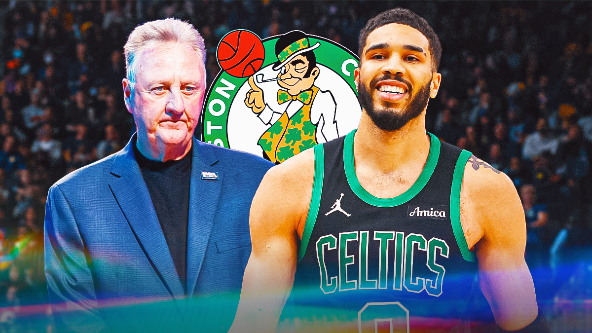 Boston Celtics player Jayson Tatum alongside Celtics player Larry Bird with the Celtics logo in the background