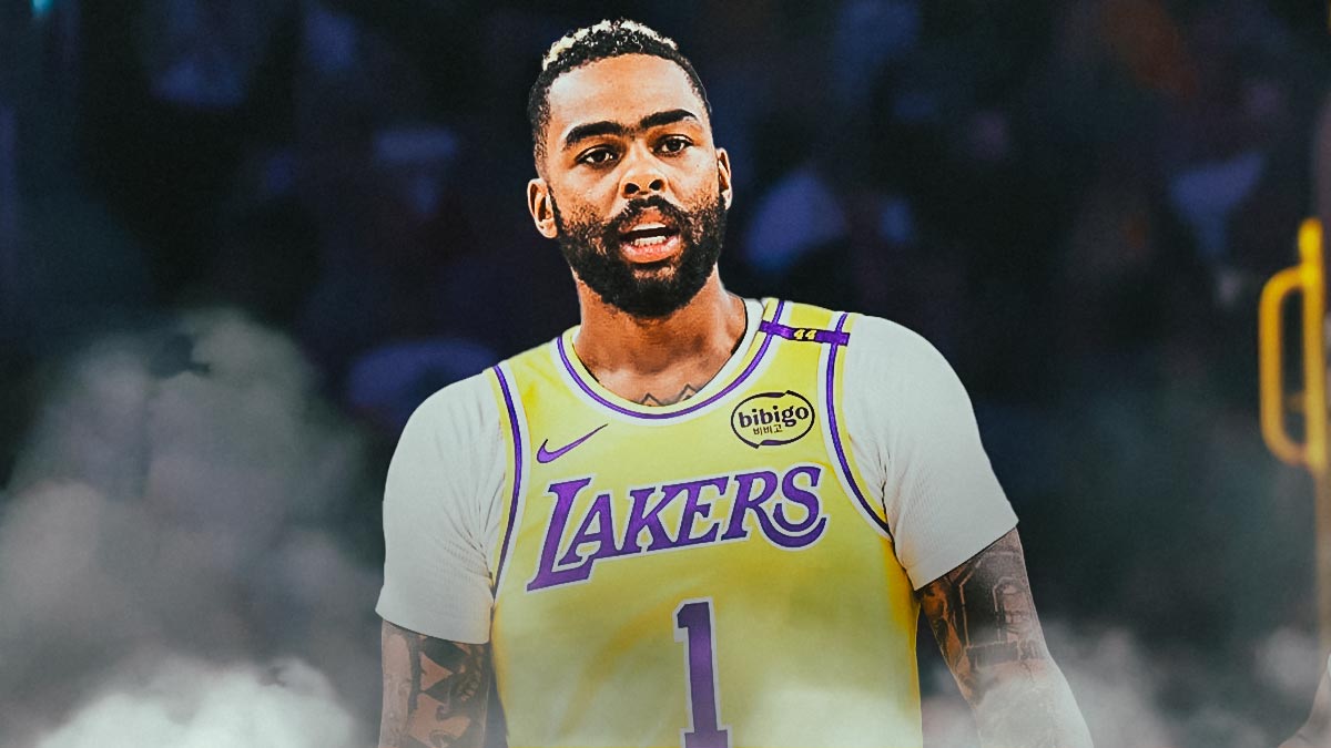 LA Lakers player D’Angelo Russell with the Lakers arena in the background, injury JJ Redick