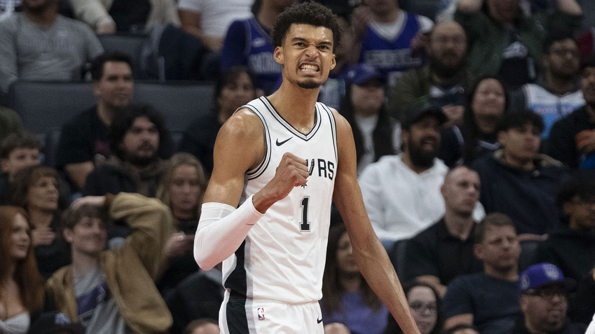December 1, 2024; Sacramento, California, USA; San Antonio Spurs center Victor Wembanyama (1) celebrates against the Sacramento Kings during the fourth quarter at Golden 1 Center.