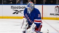 New York Rangers goaltender Igor Shesterkin (31) makes a save against the New Jersey Devils during the third period at Madison Square Garden