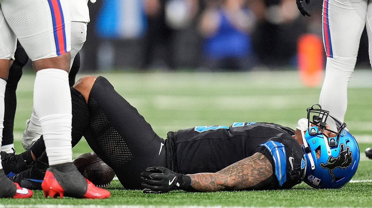 Detroit Lions running back David Montgomery (5) lays on the field after a play against the Buffalo Bills during the first half at Ford Field in Detroit.