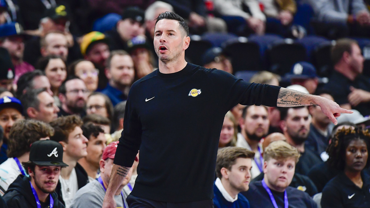 Los Angeles Lakers head coach JJ Redick calls a play on the court against the Utah Jazz during the first half at the Delta Center.