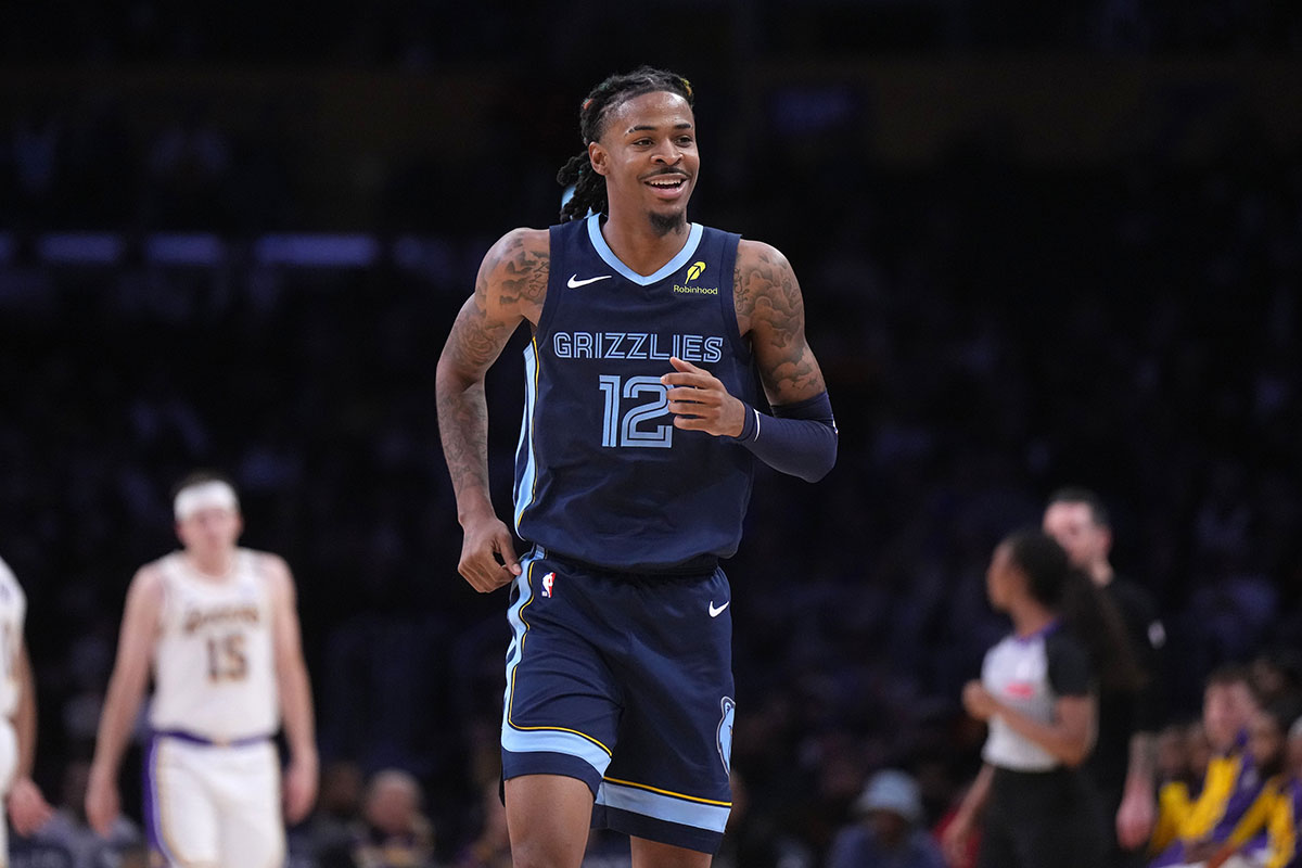 Memphis Grizzlies guard Ja Morant (12) reacts in the second half against the Los Angeles Lakers at Crypto.com Arena.