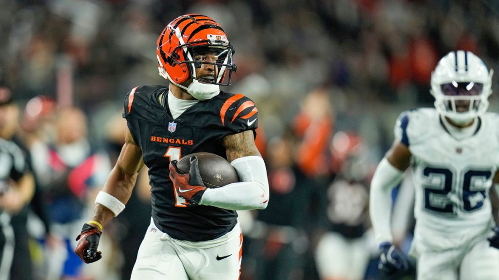 Cincinnati Bengals wide receiver Ja'Marr Chase (1) runs pass Dallas Cowboys cornerback DaRon Bland (26) in the 4th quarter for a touchdown during Monday Night Football at AT&T Stadium in Arlington,Texas on Monday, December 9, 2024. The Bengals won 27-20.