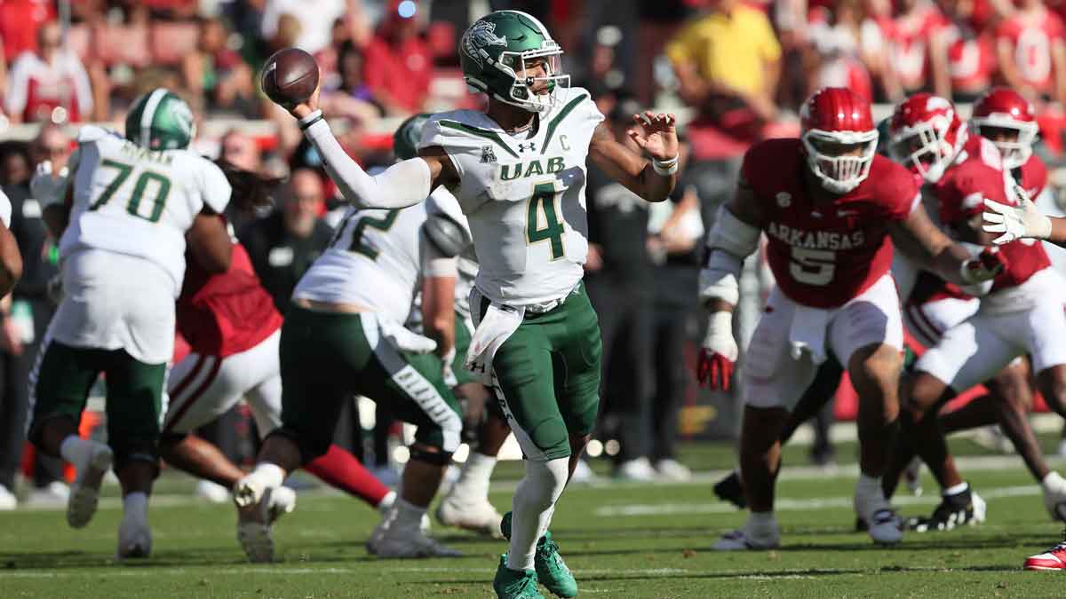 UAB Blazers quarterback Jacob Zeno (4) passes in the second quarter against the Arkansas Razorbacks at Donald W. Reynolds Razorback Stadium.