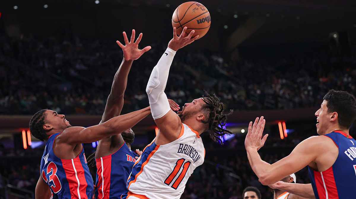 New York Knicks guard Jalen Brunson (11) shoots the ball as Detroit Pistons guard Jaden Ivey (23) defends during the second half at Madison Square Garden.