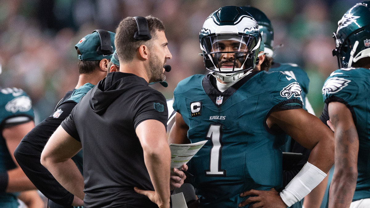 Philadelphia Eagles quarterback Jalen Hurts (1) talks with head coach Nick Sirianni during a timeout in the first quarter against the Atlanta Falcons at Lincoln Financial Field.