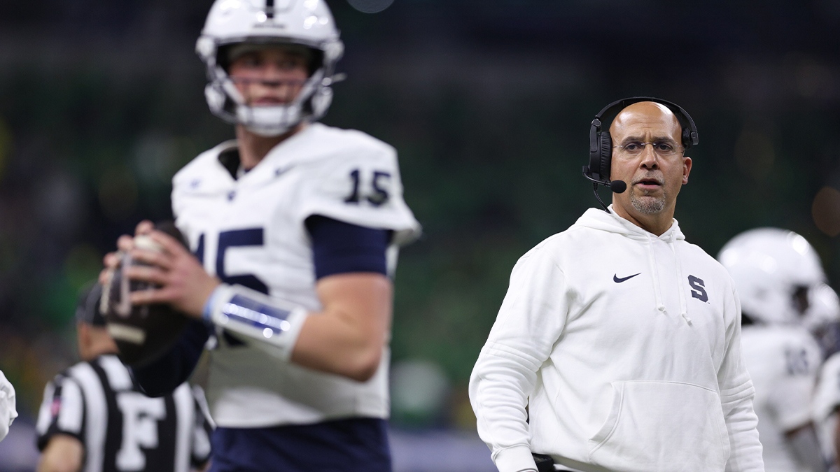Penn State Nittany Lions head coach James Franklin watches quarterback Drew Allar (15) throw against the Oregon Ducks during the second quarter in the 2024 Big Ten Championship game at Lucas Oil Stadium.