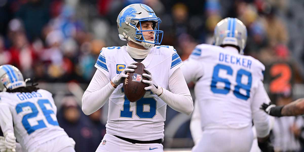 Dec 22, 2024; Chicago, Illinois, USA; Detroit Lions quarterback Jared Goff (16) looks to pass against the Chicago Bears during the fourth quarter at Soldier Field. Mandatory Credit: Daniel Bartel-Imagn Images