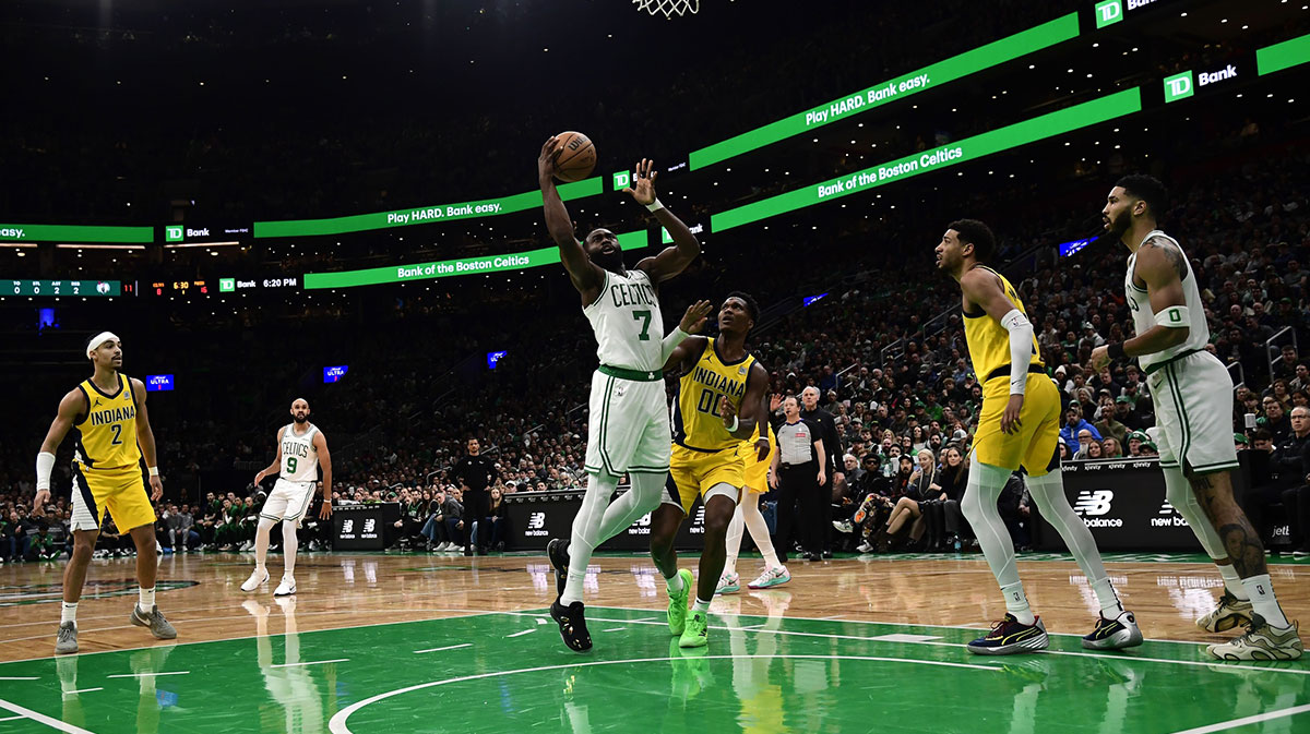 Boston Celtics guard Jaylen Brown (7) drives to the basket past Indiana Pacers guard Bennedict Mathurin (00) during the first half at TD Garden