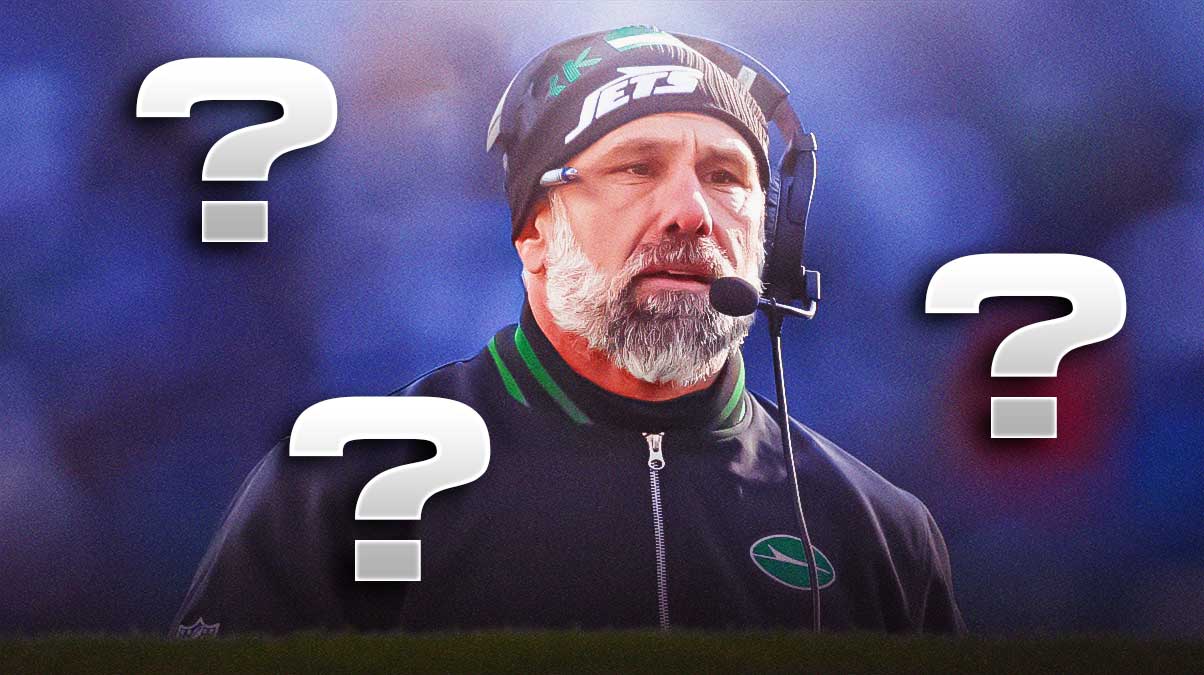 New York interim head coach Jeff Ulbrich with question marks around him in front of MetLife Stadium.