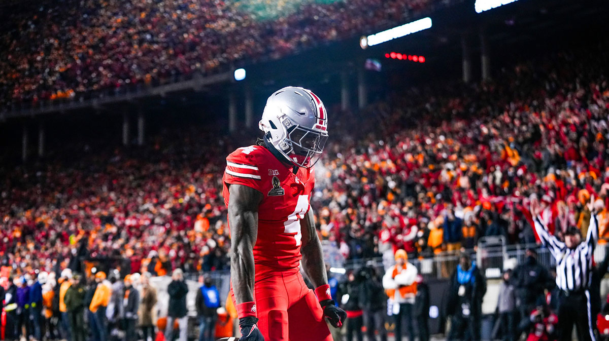 Ohio State Buckeyes wide receiver Jeremiah Smith (4) reacts after scoring a touchdown in the first half at Ohio Stadium