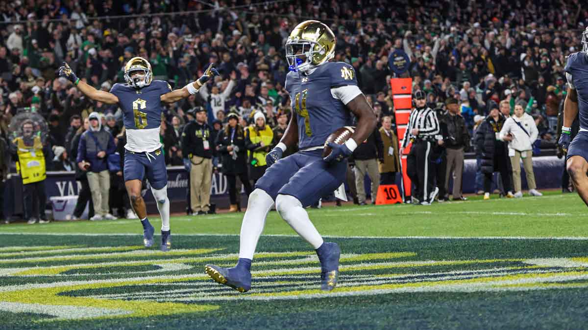 Notre Dame Fighting Irish running back Jeremiyah Love (4) scores a touchdown during the first half against the Army Black Knights at Yankee Stadium.