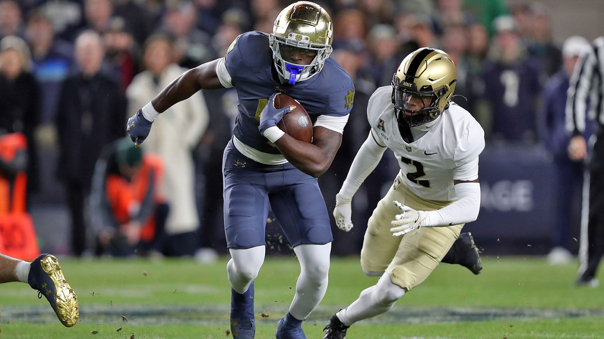 Notre Dame Fighting Irish running back Jeremiyah Love (4) runs the ball against the Army Black Knights during the first half at Yankee Stadium.