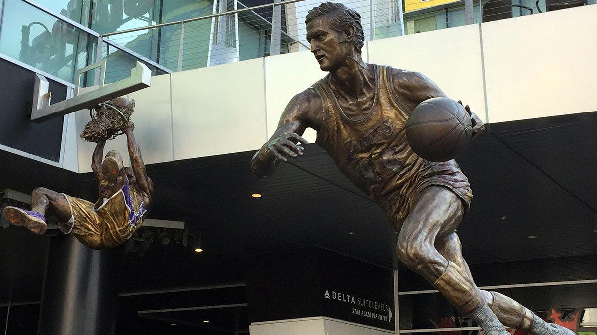 Statues of Los Angeles Lakers former guard Jerry West (44) and center Shaquille O'Neal (34) outside of the Staples Center during a NBA basketball game against the Minnesota Timberwolves.