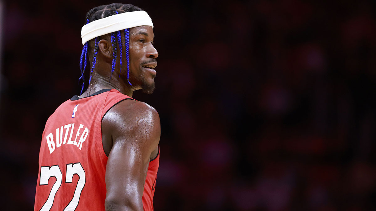 Miami Heat forward Jimmy Butler (22) smiles at the bench against the Cleveland Cavaliers during the second half at Kaseya Center.