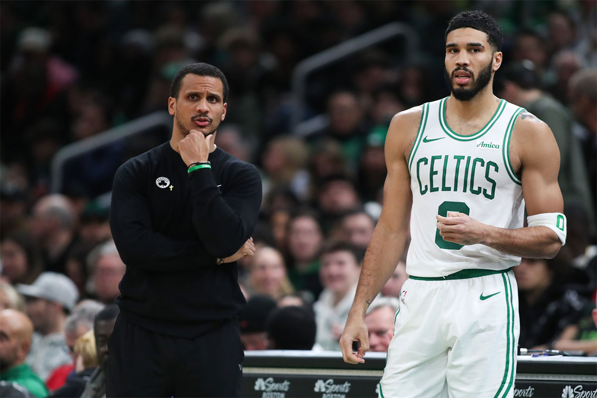 Boston Celtics head coach Joe Mazzulla and Boston Celtics forward Jayson Tatum (0) react during the first half against the Memphis Grizzlies at TD Garden.